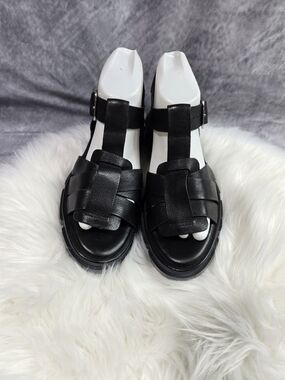 Free People Brooks black chunky fisherman sandals featuring a lug platform sole